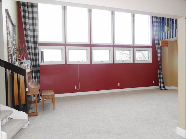 652 Simms Ashuelot Rd, Fort Shaw, MT 59443 - sitting room with carpet floors, baseboards, and stairway