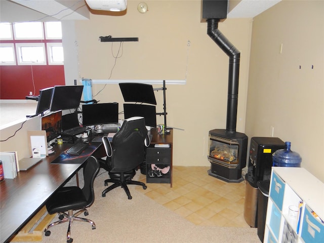 652 Simms Ashuelot Rd, Fort Shaw, MT 59443 - office space featuring light tile patterned floors and a wood stove