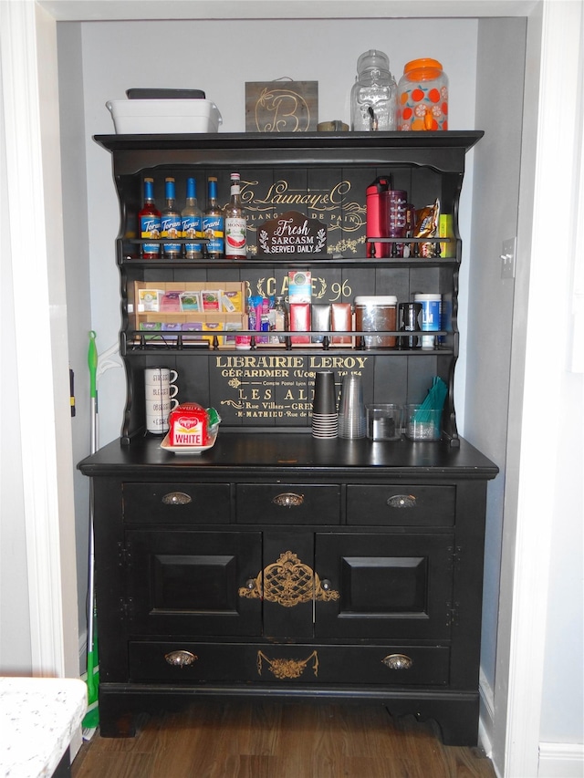 652 Simms Ashuelot Rd, Fort Shaw, MT 59443 - bar with baseboards and dark wood-style floors