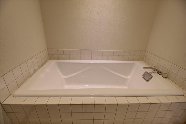 bathroom featuring a garden tub