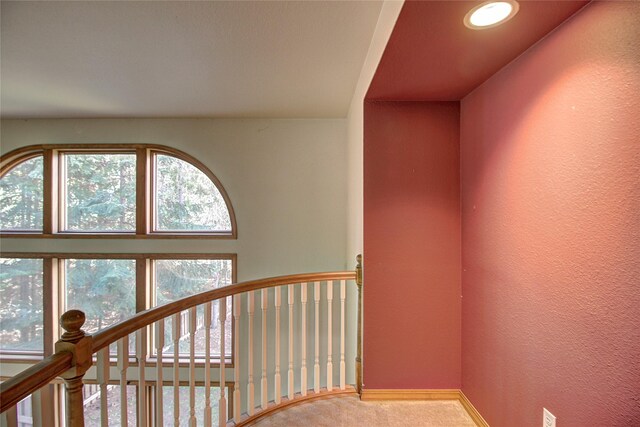 stairs featuring recessed lighting, carpet floors, a textured wall, and baseboards