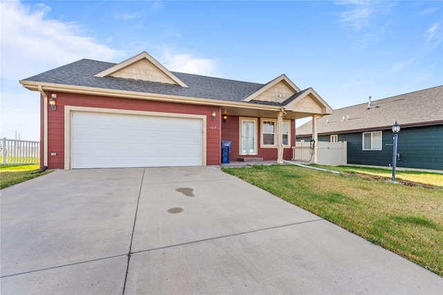 809 49th St N, Great Falls, MT 59405 - ranch-style house featuring driveway, fence, a garage, and a front yard