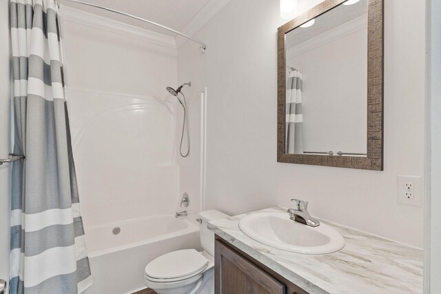 bathroom with toilet, crown molding, vanity, and shower / bathtub combination with curtain