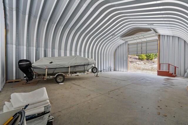 87 Hodge Rdg, Kila, MT 59920 - miscellaneous room with a garage and vaulted ceiling