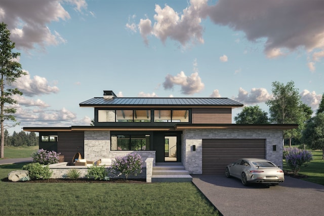 10695 Royal Coachman Dr, Missoula, MT 59808 - modern home featuring stone siding, concrete driveway, and a front yard