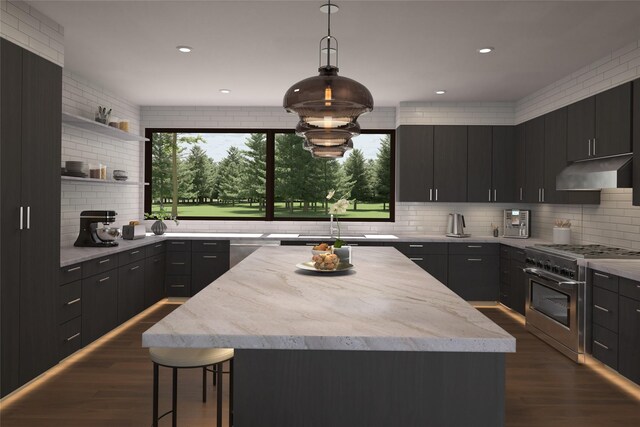 10695 Royal Coachman Dr, Missoula, MT 59808 - kitchen with stainless steel range, under cabinet range hood, backsplash, dark wood-type flooring, and a center island