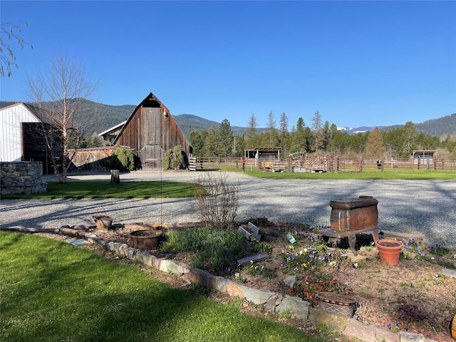 5 Whitepine Ranch Ln, Trout Creek, MT 59874 - view of street with a mountain view and a barn