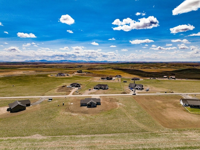 drone / aerial view with a rural view and a mountain view