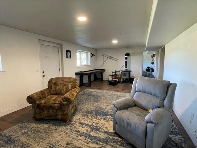 398 Little Beaver Creek Rd, Trout Creek, MT 59874 - living room featuring baseboards, wood finished floors, recessed lighting, and a wood stove