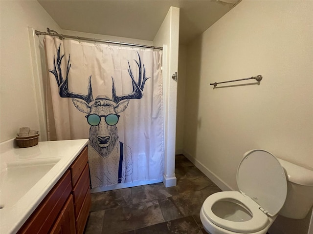 398 Little Beaver Creek Rd, Trout Creek, MT 59874 - full bathroom featuring toilet, vanity, and curtained shower