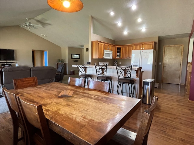 398 Little Beaver Creek Rd, Trout Creek, MT 59874 - dining room featuring vaulted ceiling, a ceiling fan, wood finished floors, and recessed lighting