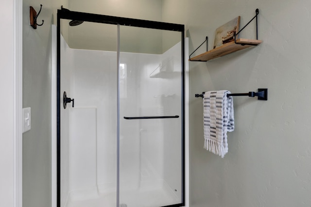 bathroom with a stall shower