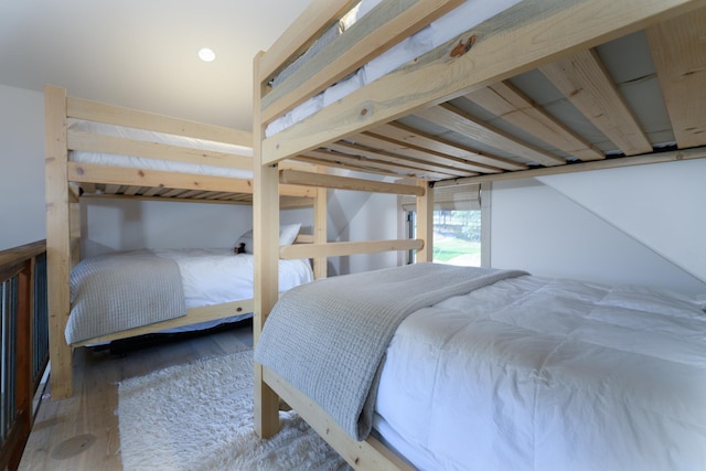 bedroom featuring wood finished floors