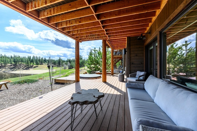 wooden deck with an outdoor hangout area