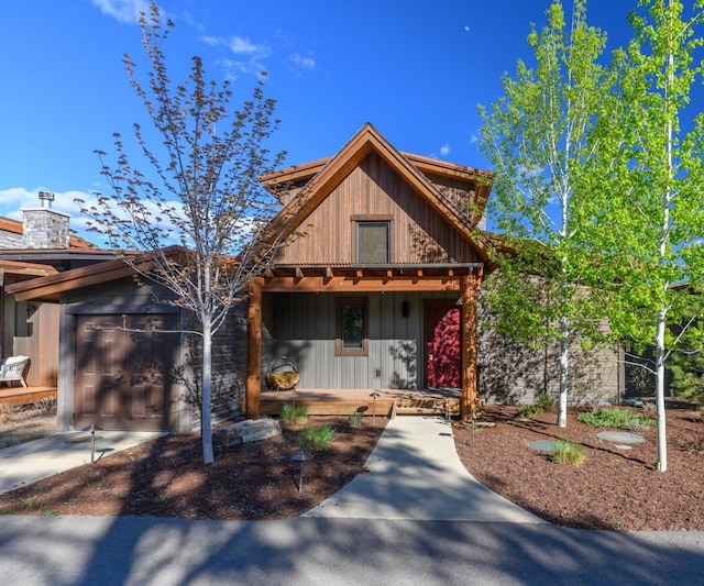 60 Cottage Lake Ln, Eureka, MT 59917 - view of front of house featuring a garage and a porch