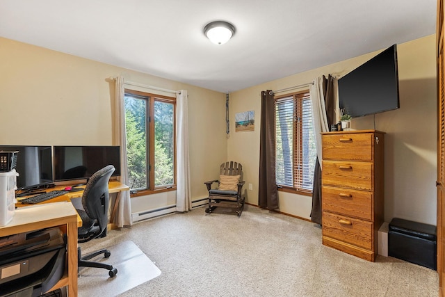 carpeted office space with baseboards and a baseboard radiator