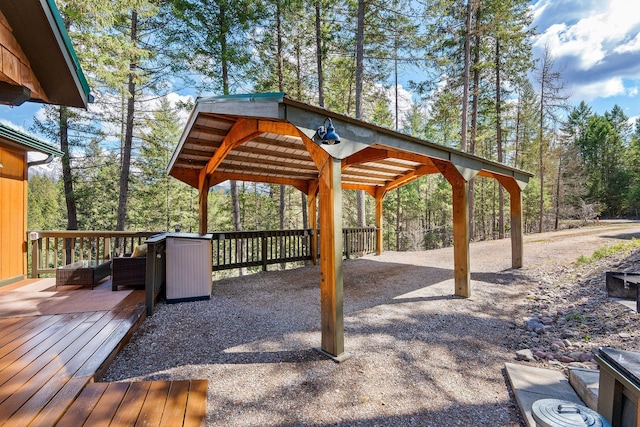 surrounding community with a wooden deck