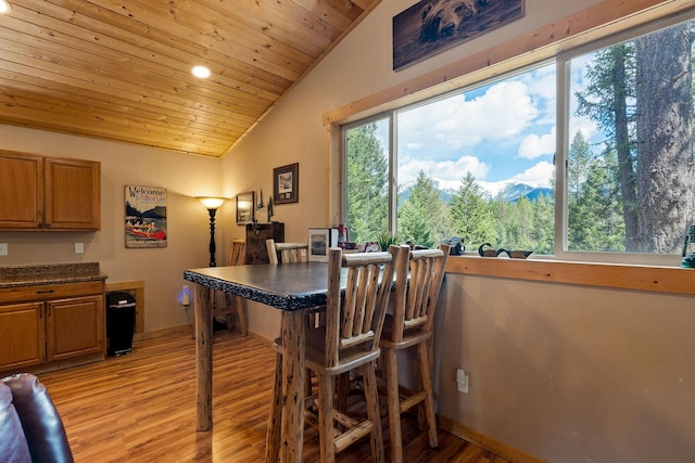 interior space with recessed lighting, vaulted ceiling, wood ceiling, and light wood-type flooring