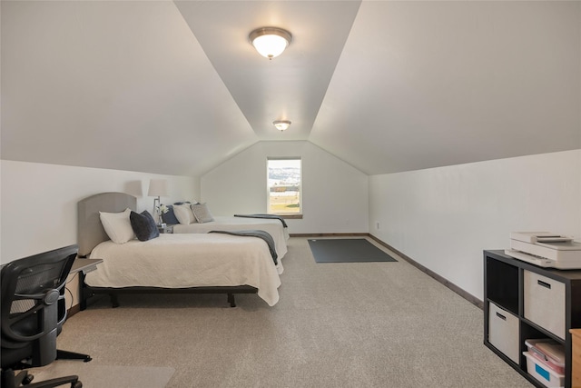 2277 Spring Wheat Loop, East Helena, MT 59635 - bedroom featuring carpet flooring, vaulted ceiling, and baseboards