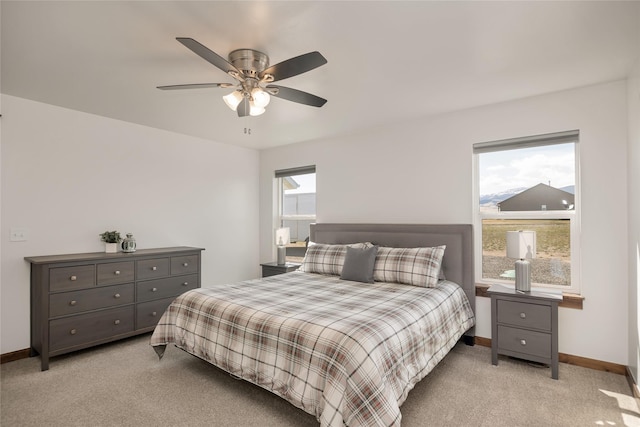 2277 Spring Wheat Loop, East Helena, MT 59635 - bedroom with baseboards, light colored carpet, and a ceiling fan
