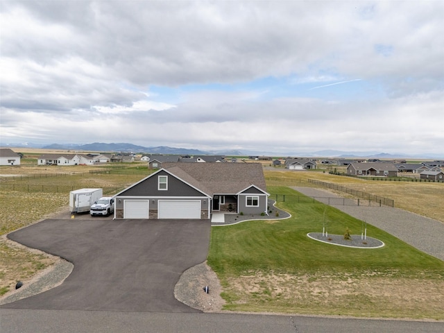 2277 Spring Wheat Loop, East Helena, MT 59635 - single story home with driveway, a garage, a mountain view, and a residential view