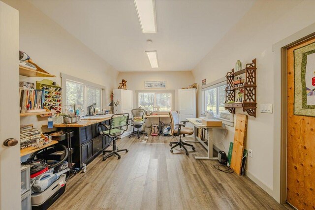 office featuring baseboards and wood finished floors