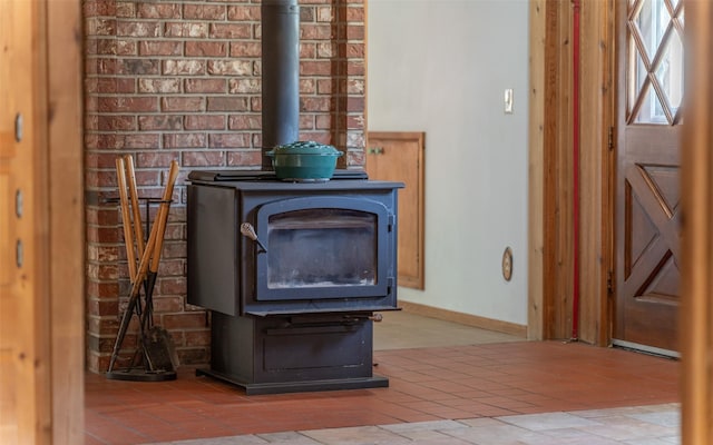 1298 E Mountain Meadow Rd, Kalispell, MT 59901 - detailed view of a wood stove and baseboards