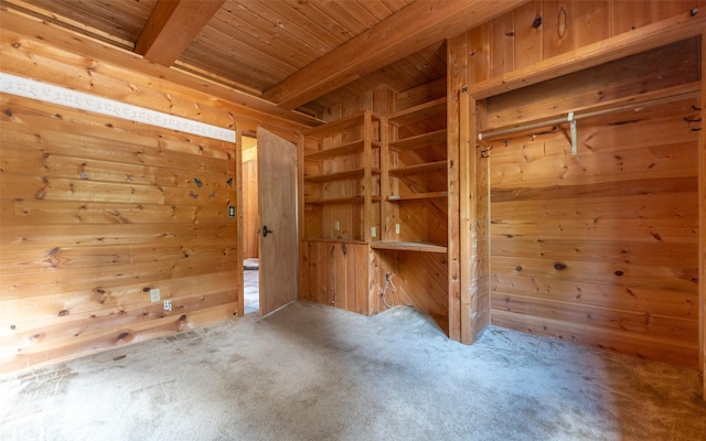 1298 E Mountain Meadow Rd, Kalispell, MT 59901 - unfurnished bedroom featuring a wooden ceiling with exposed beams, carpet floors, and wooden walls