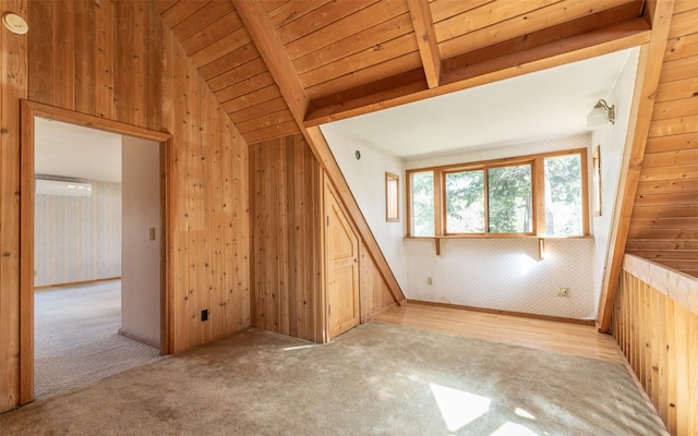 1298 E Mountain Meadow Rd, Kalispell, MT 59901 - unfurnished room featuring light carpet, wooden walls, and wood ceiling