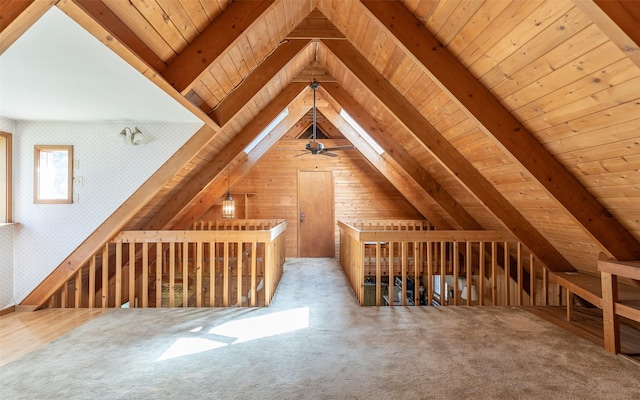 1298 E Mountain Meadow Rd, Kalispell, MT 59901 - additional living space featuring wood ceiling, wooden walls, and carpet