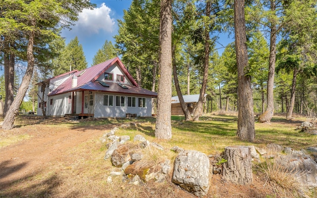 1298 E Mountain Meadow Rd, Kalispell, MT 59901 - view of front of property with a metal roof