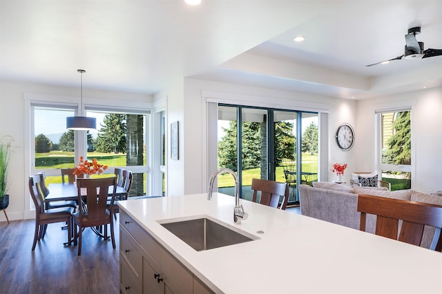 1347 Lake Pointe Dr, Bigfork, MT 59911 - kitchen with light countertops, dark wood-style flooring, pendant lighting, open floor plan, and recessed lighting