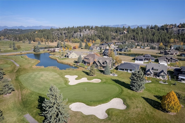 1347 Lake Pointe Dr, Bigfork, MT 59911 - aerial view of property and surrounding area with a water and mountain view, a golf club, and nearby suburban area