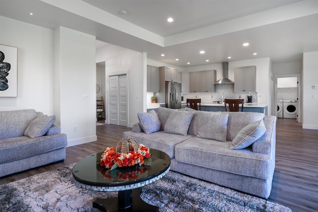 1347 Lake Pointe Dr, Bigfork, MT 59911 - living room with washing machine and clothes dryer, dark wood finished floors, and recessed lighting