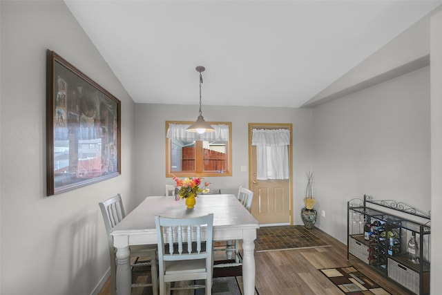 3404 Jasper Rd, Great Falls, MT 59404 - dining space with wood finished floors and lofted ceiling