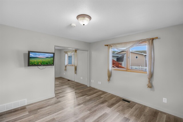 3404 Jasper Rd, Great Falls, MT 59404 - unfurnished room with wood finished floors and a smoke detector