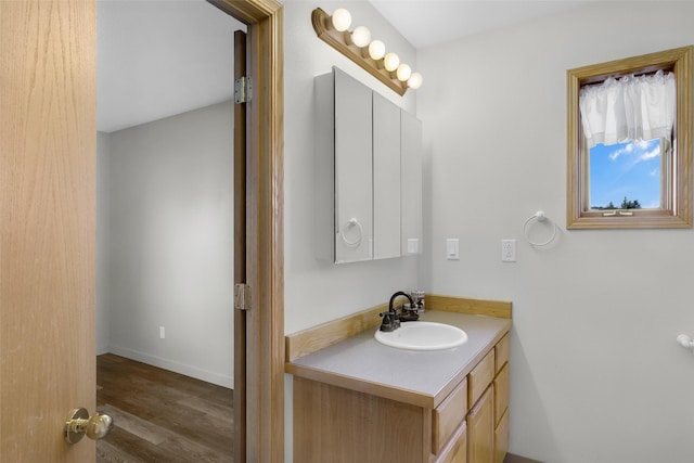 3404 Jasper Rd, Great Falls, MT 59404 - bathroom with vanity and wood finished floors