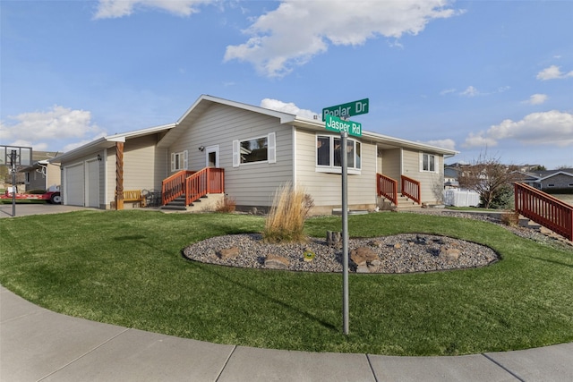3404 Jasper Rd, Great Falls, MT 59404 - view of front of home featuring a garage and concrete driveway