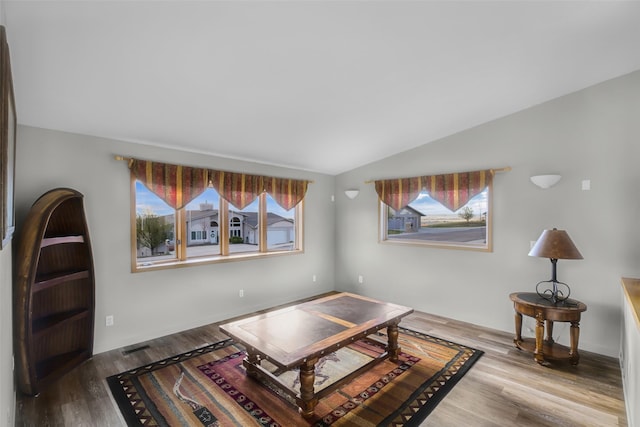 3404 Jasper Rd, Great Falls, MT 59404 - living room with vaulted ceiling and wood finished floors