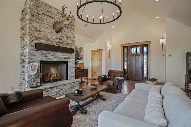 160 Jackson Creek Rd, Clancy, MT 59634 - living room featuring high vaulted ceiling, wood finished floors, a fireplace, and recessed lighting