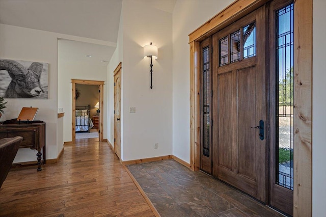 160 Jackson Creek Rd, Clancy, MT 59634 - foyer entrance with baseboards and dark wood-style flooring