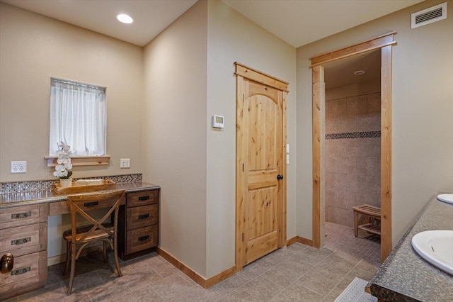 160 Jackson Creek Rd, Clancy, MT 59634 - home office featuring baseboards and a sink