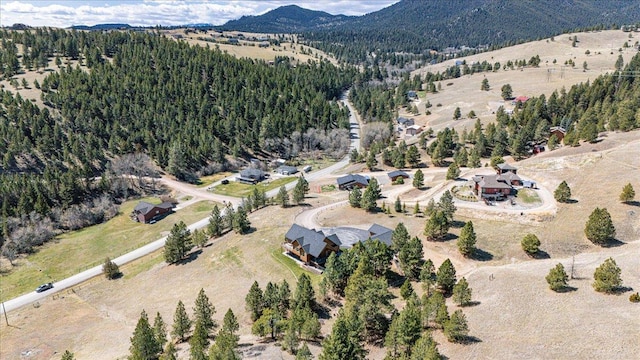 160 Jackson Creek Rd, Clancy, MT 59634 - aerial overview of property's location featuring a mountain backdrop and a forest
