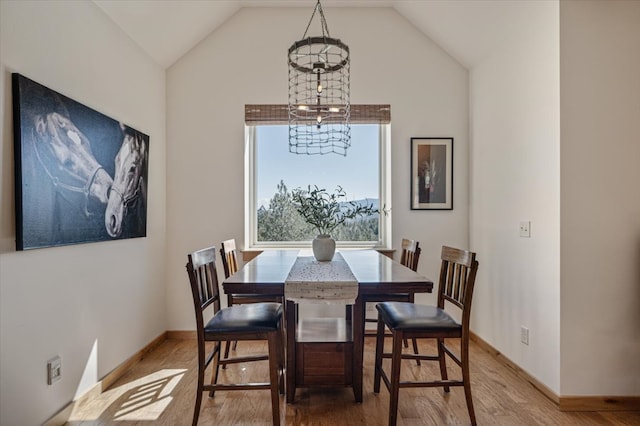 160 Jackson Creek Rd, Clancy, MT 59634 - dining space featuring light wood-type flooring and vaulted ceiling