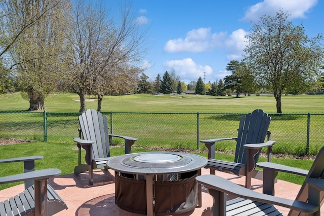 14 Buffalo Hill Cir, Kalispell, MT 59901 - view of patio with golf course view and an outdoor fire pit
