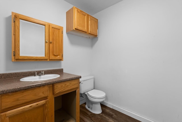 30580 Cayuse Ln, Bigfork, MT 59911 - half bath featuring wood finished floors and vanity