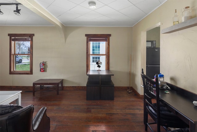 916 2nd St E, Whitefish, MT 59937 - dining space featuring crown molding, dark wood-style floors, and plenty of natural light
