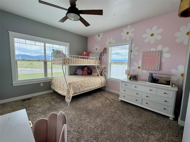 19 Country Meadow Ln, Clancy, MT 59634 - carpeted bedroom featuring multiple windows and ceiling fan