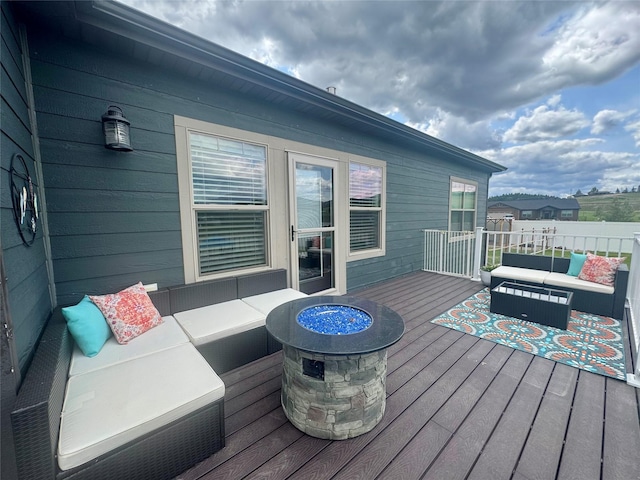 19 Country Meadow Ln, Clancy, MT 59634 - deck featuring an outdoor living space with a fire pit