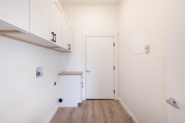 209 Pearl St, Ennis, MT 59729 - laundry room with electric dryer hookup, cabinet space, hookup for a washing machine, light wood-style floors, and baseboards